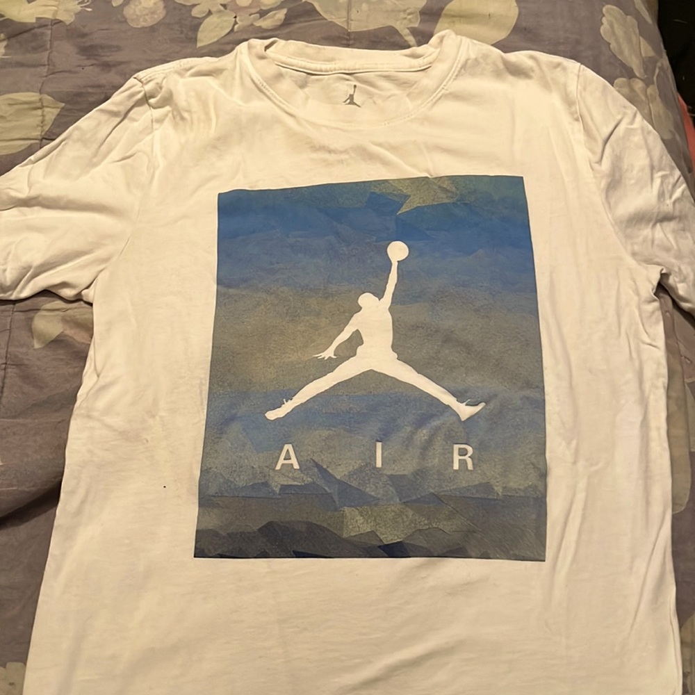 A Jordan t shirt. The size is a boys large.